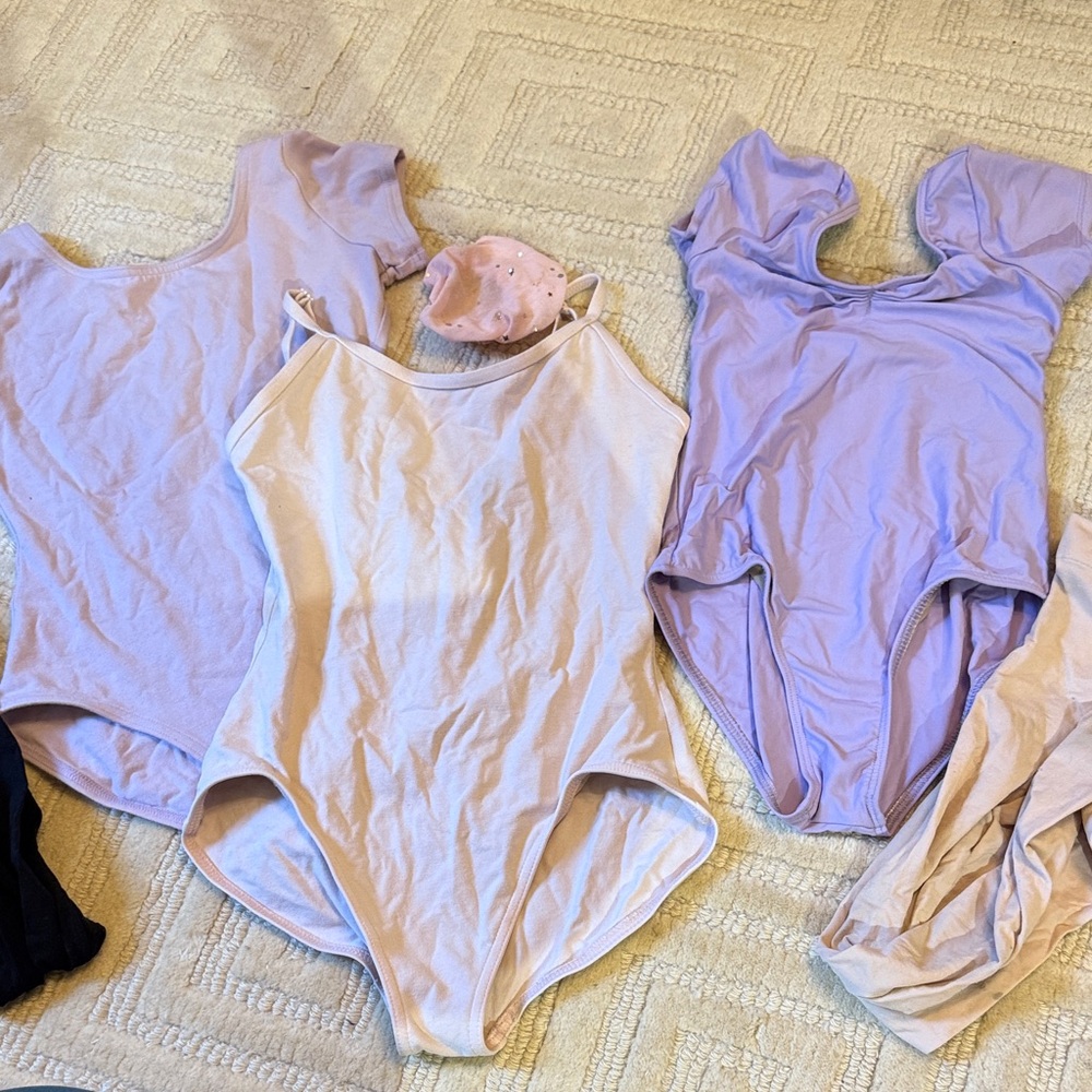 Eight leotards Kids Lavender and light pink and black. One Piece Set